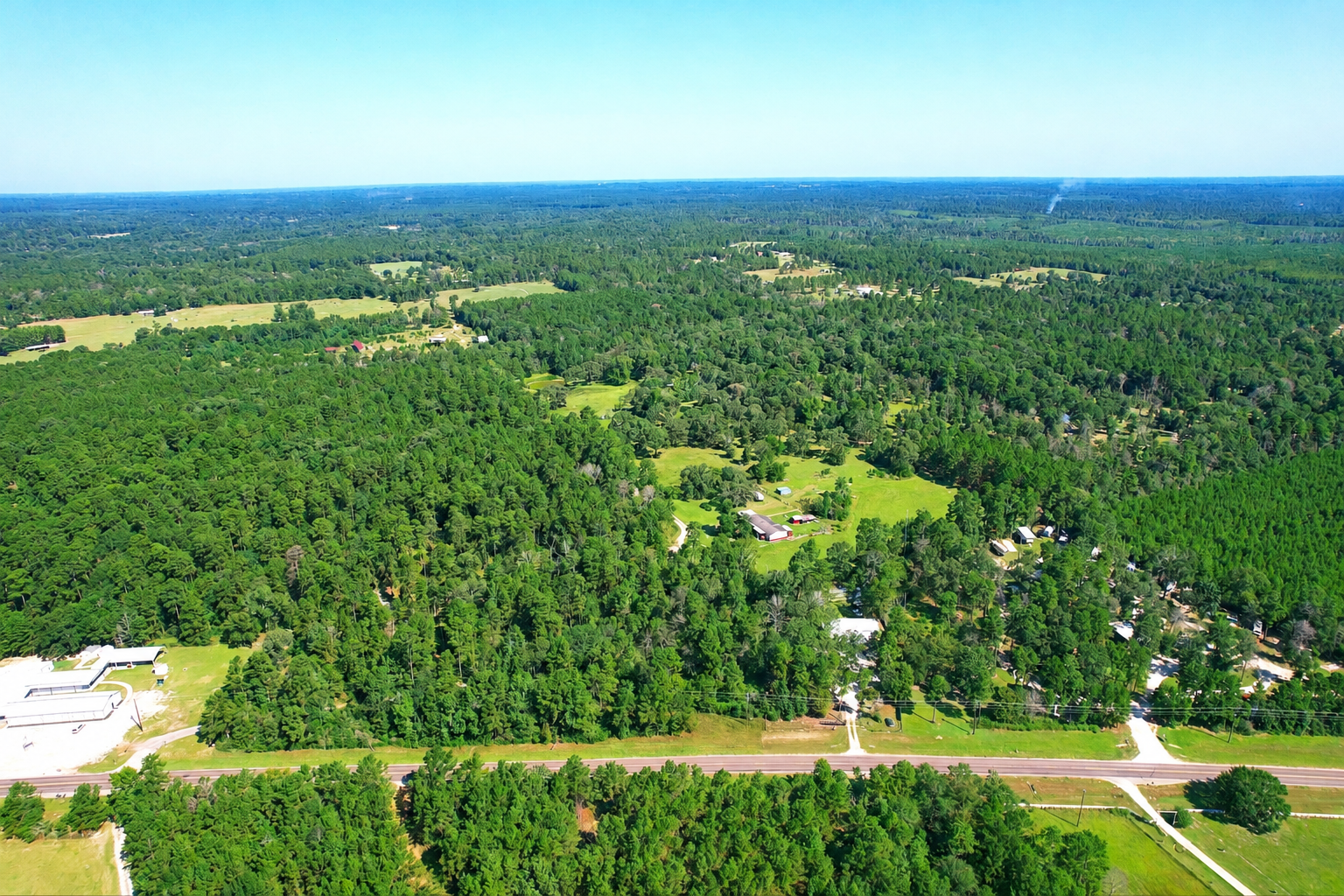 Aerial drone photography of rural land and forested property for land mapping in Greater Houston