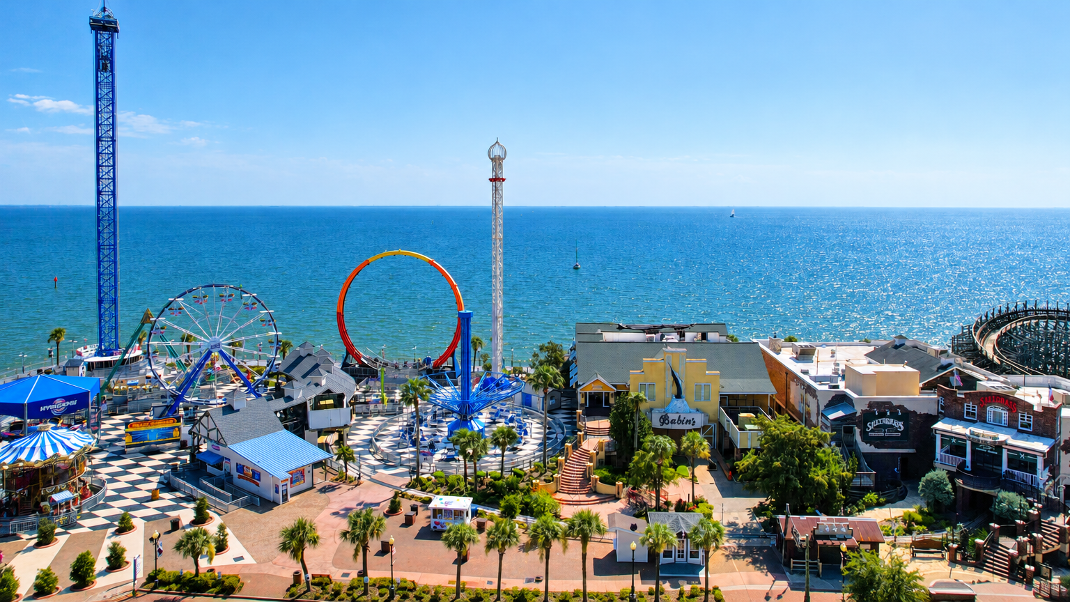 Aerial drone photography of a coastal amusement park and pier near Galveston, Texas