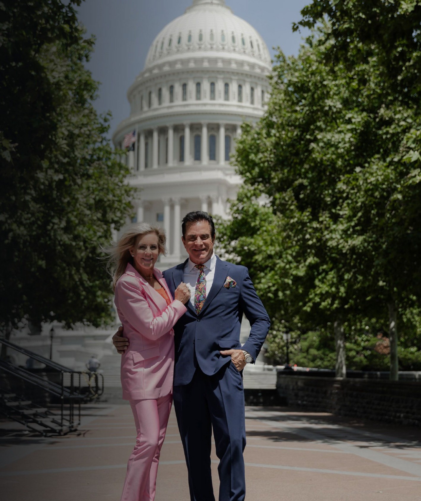 Steve and Gina Merritt standing together in Washington, D.C., with the U.S. Capitol dome behind them