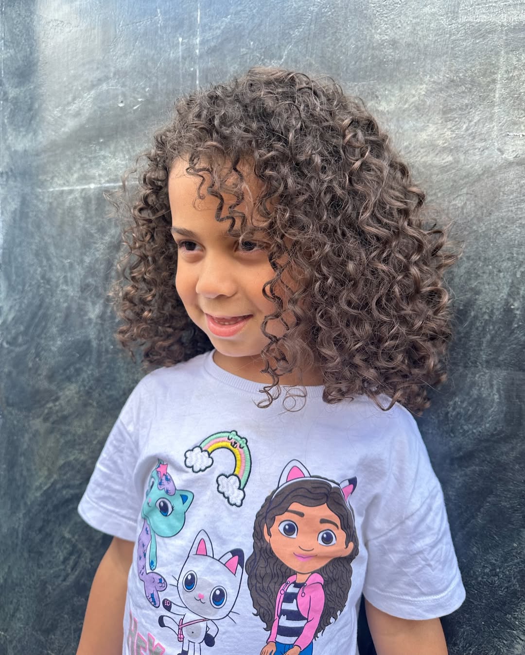 Adorable natural curls at 3thirty Salon