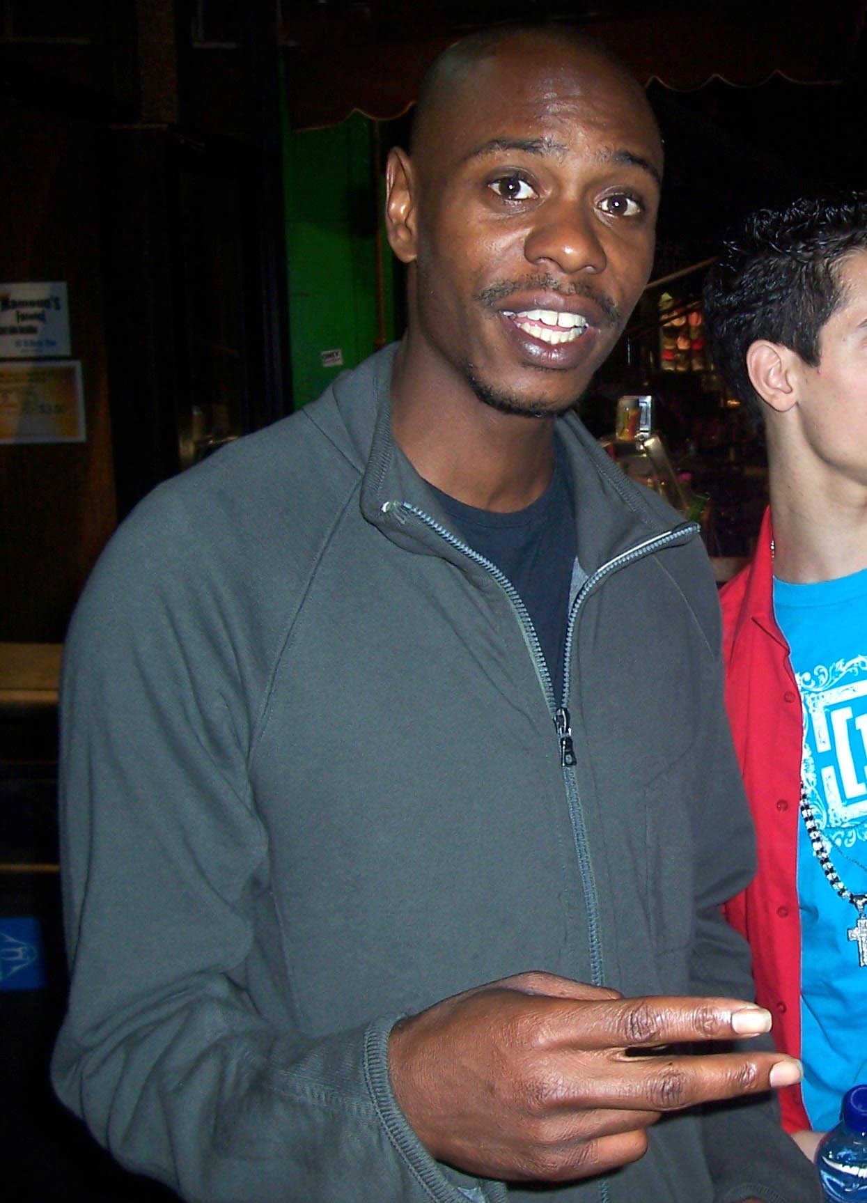 Dave Chappelle performing stand-up comedy