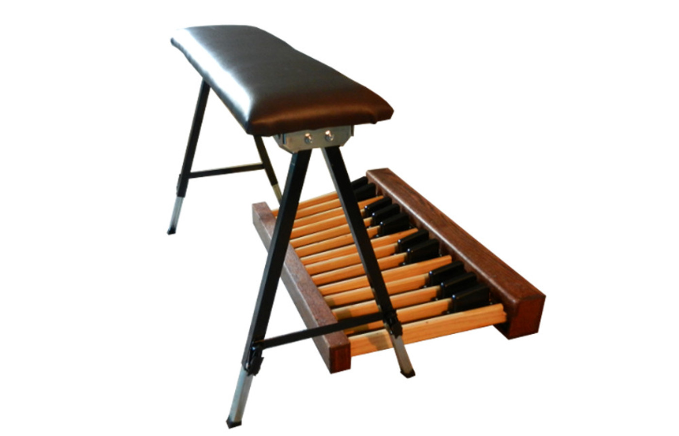 Folding height adjustable organ bench with a padded brown seat, standing over an oak bass pedalboard