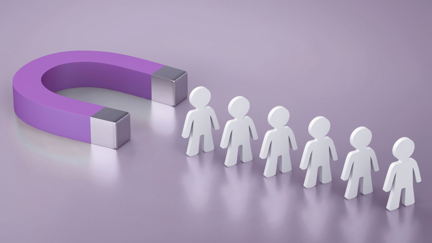 Purple magnet attracting talent - representing how strong employer brands attract top candidates
