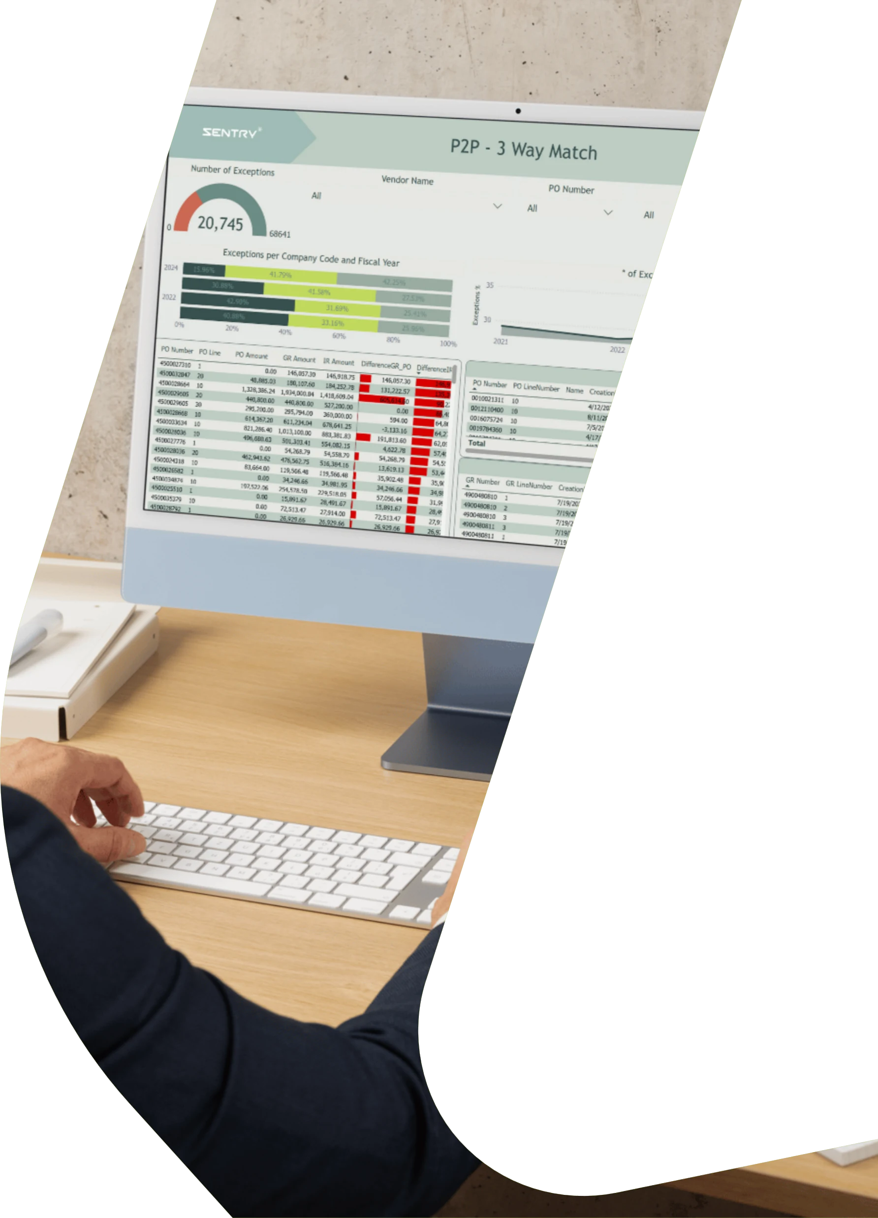 Analyst at a desk working with the SentrIQ P2P 3-way match dashboard