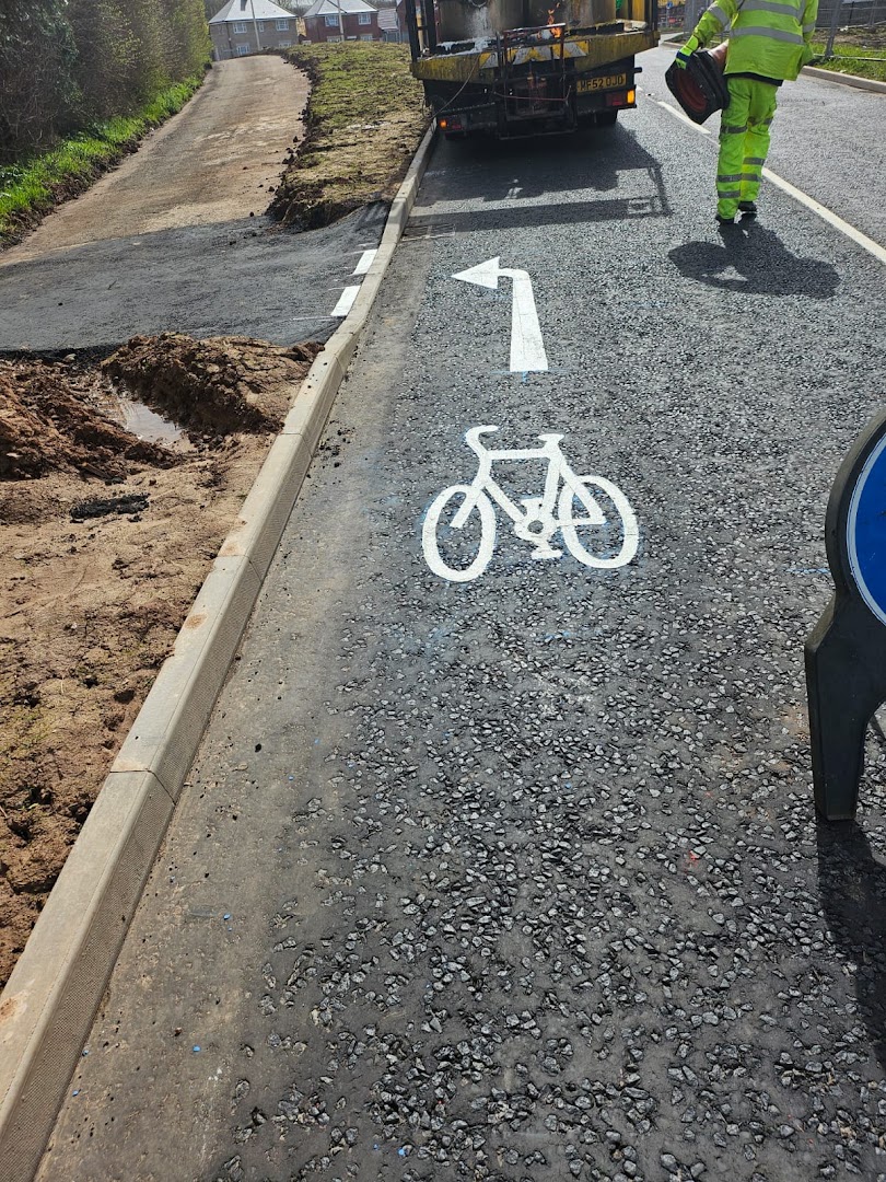 highway cycle symbol + arrow, ledbury