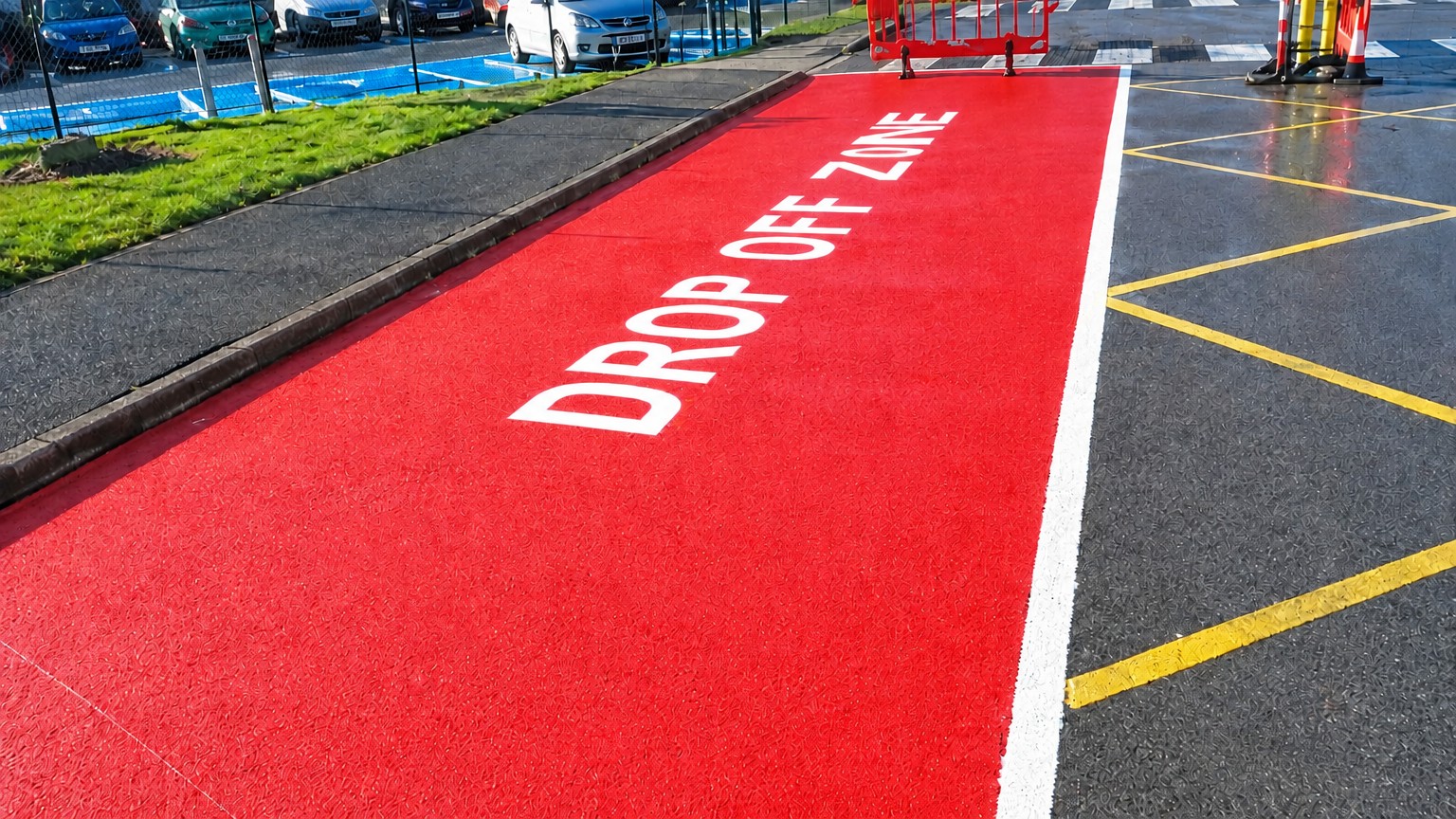 Red drop off zone markings