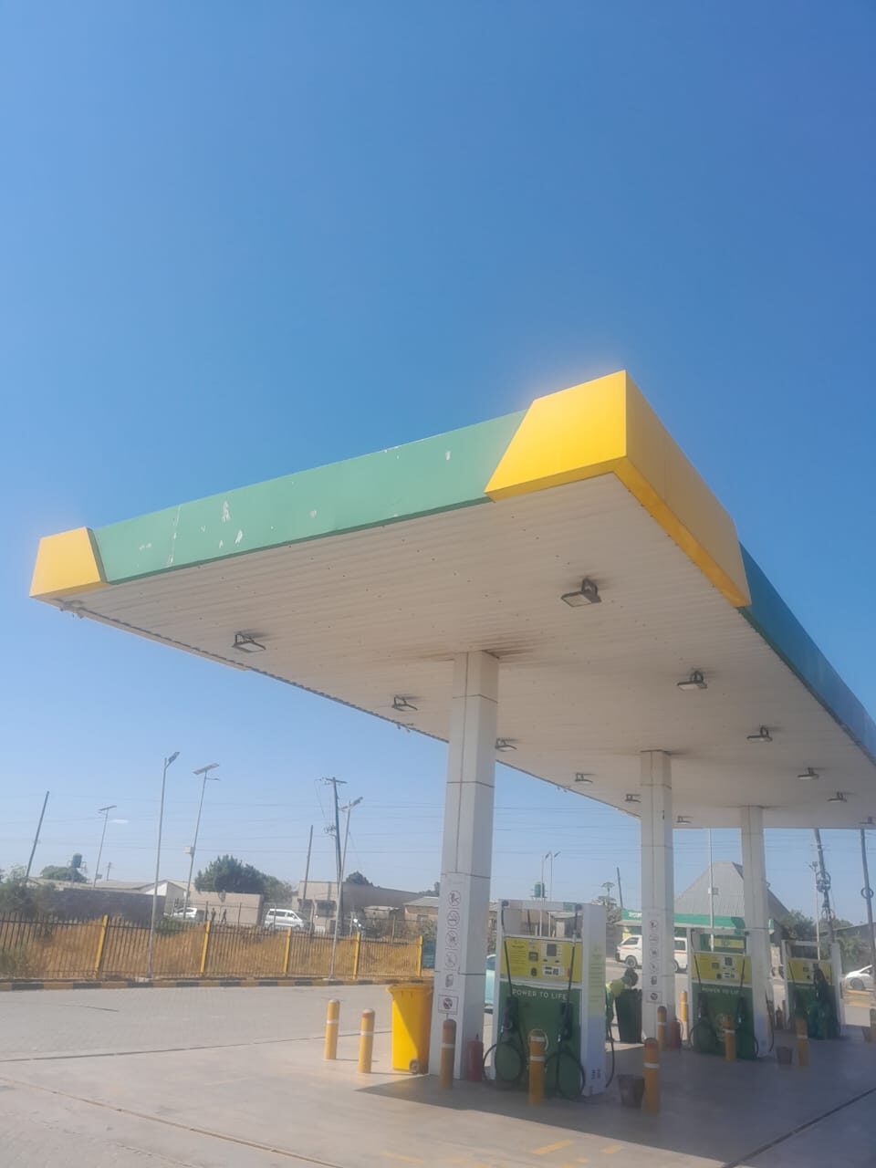 Forecourt canopy branding at a fuel station