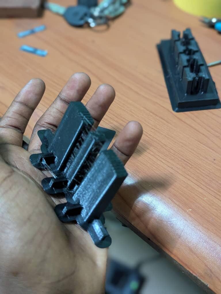 FDM 3D-printed prototype parts held in two hands