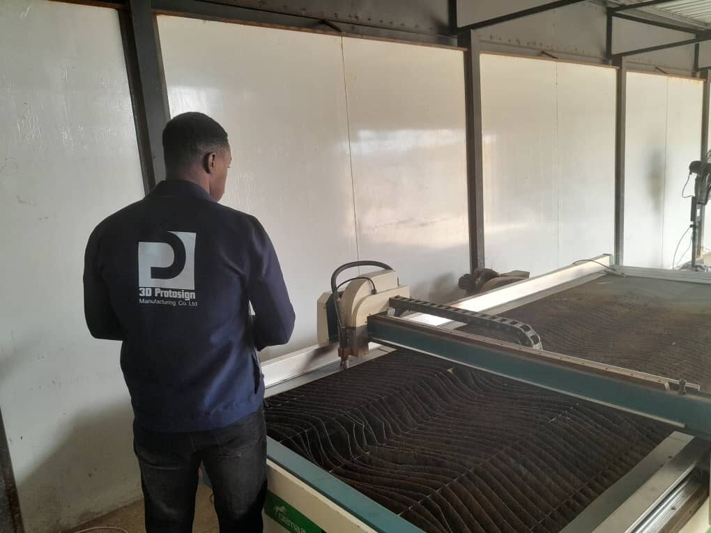 Operator running the CNC plasma cutter