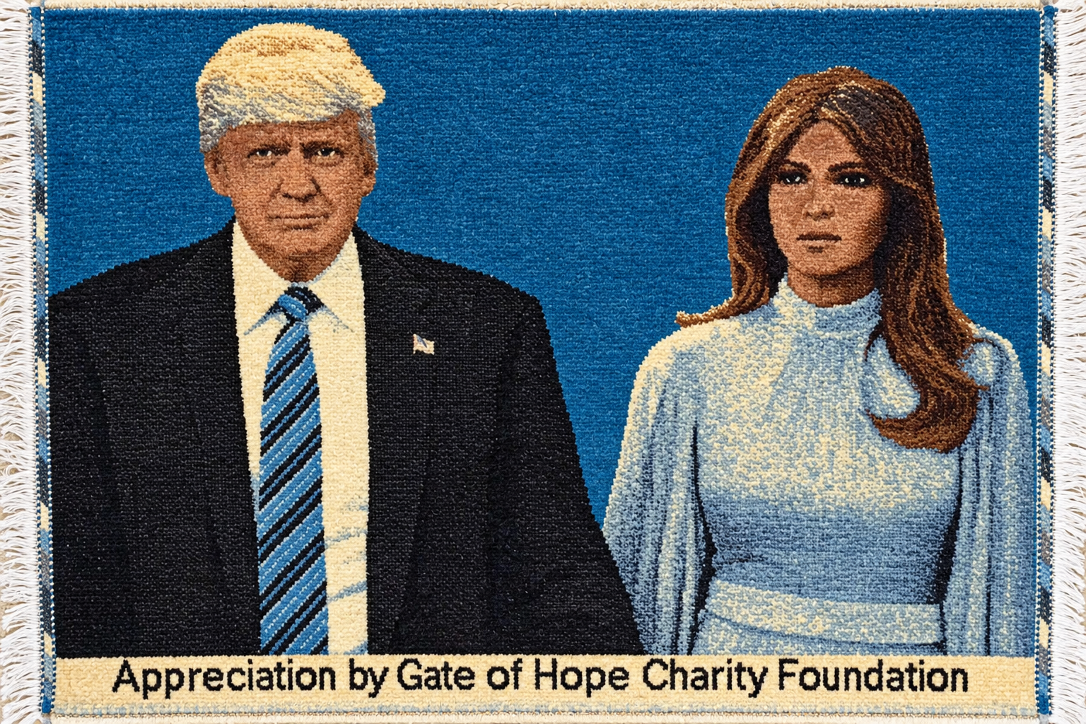 Handwoven carpet created by Afghan women carpet weavers depicting former President Donald Trump and First Lady Melania Trump